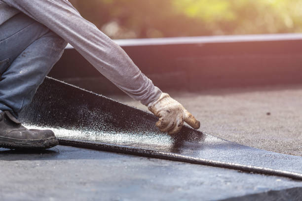 Professional Waterproofing technician working in Hamilton, MI